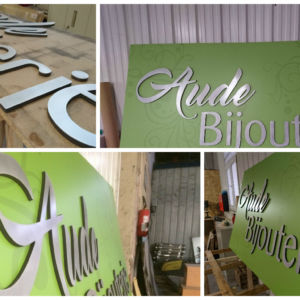 enseigne avec lettrage en relief